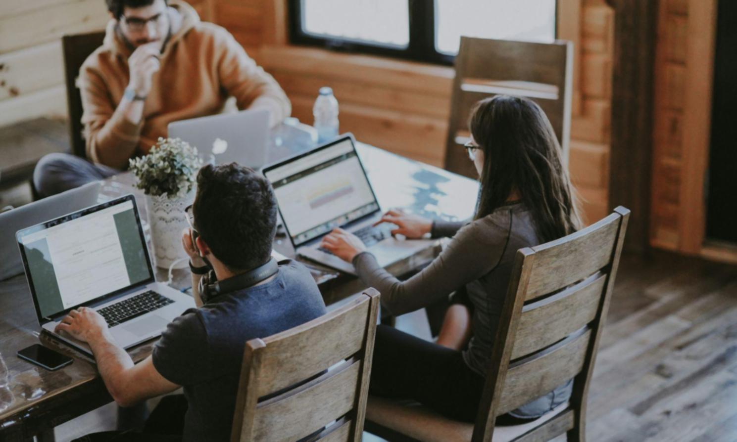 Family reviewing investment planning documents together